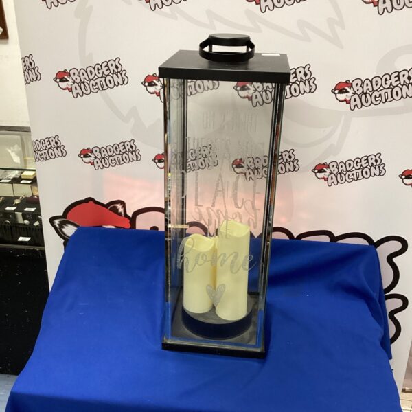 Large black battery candle lantern for home decor.