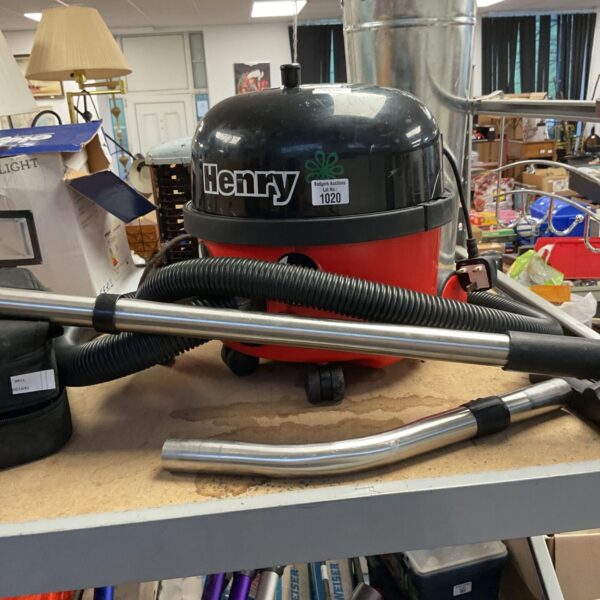 Red Numatic Henry cylinder vacuum cleaner, vintage domestic appliance.