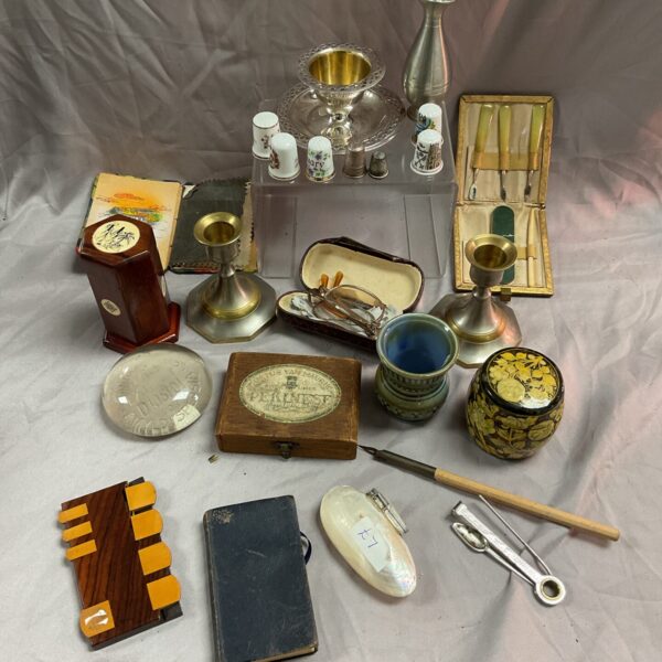 Mixed lot of vintage collectibles including boxes and candlesticks.