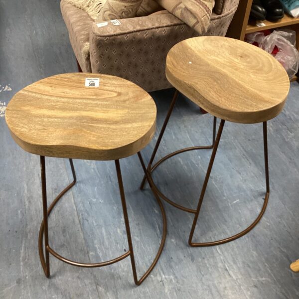 Pair of rustic oak stools with circular seats.
