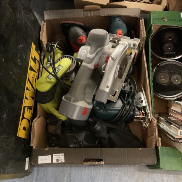 Mixed tool lot featuring a Black and Decker power tool.
