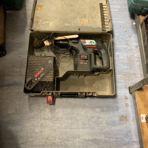 Vintage Bosch 24v hammer drill in its original carrying case.