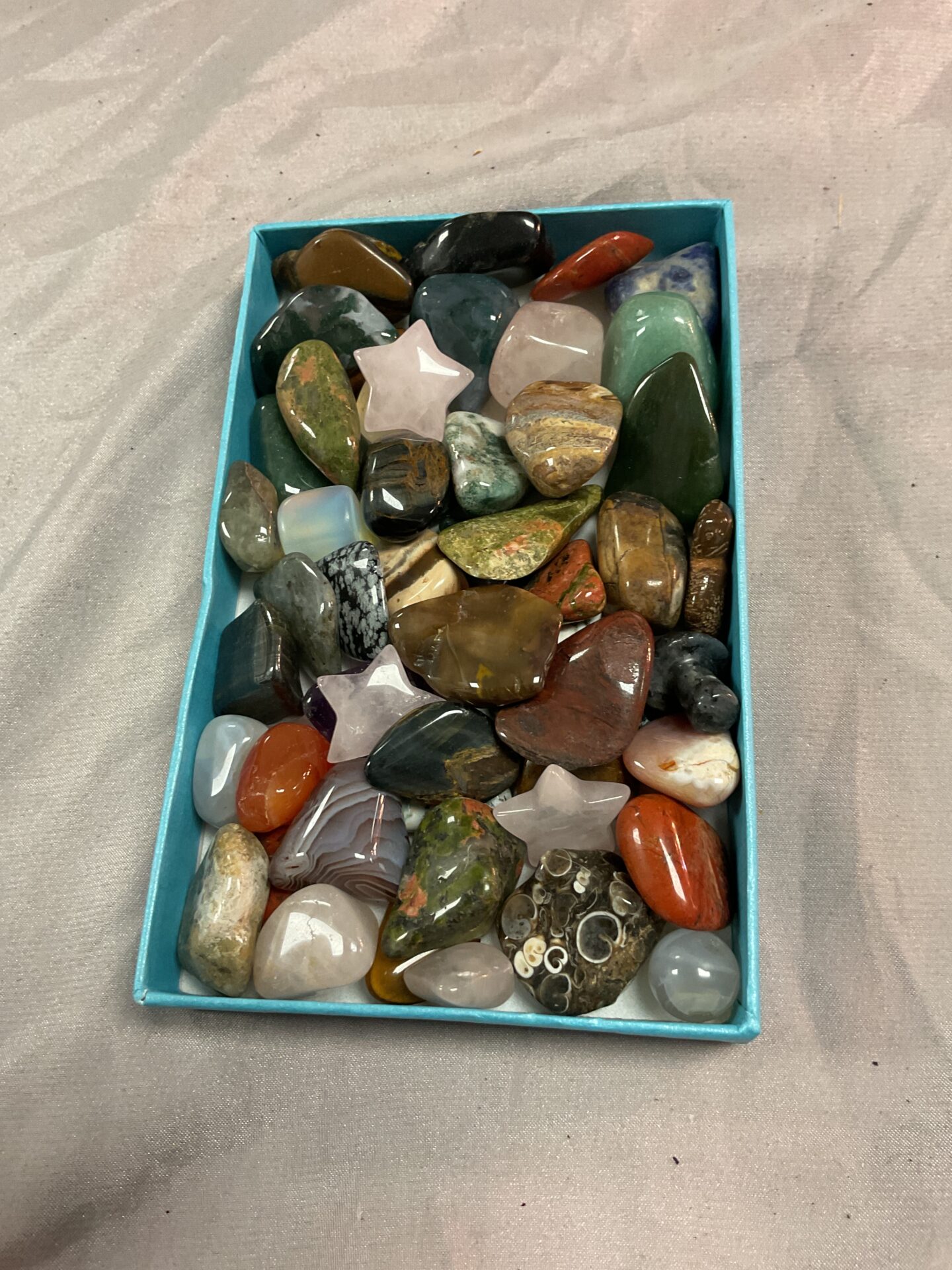 775 Box of assorted polished stones