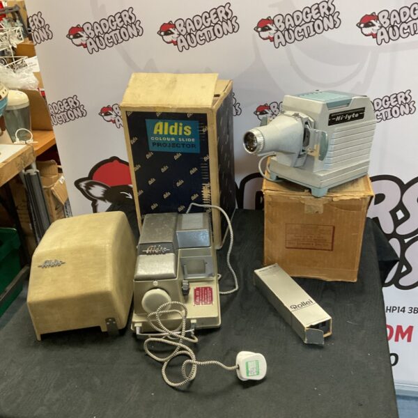 Vintage Aldis and Hi-Lyte slide projectors in a lot.