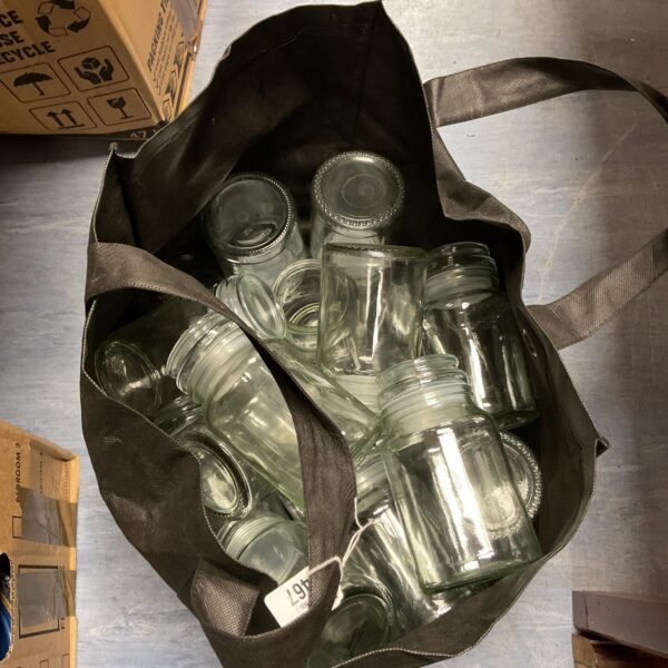 Mixed lot of glass storage jars for kitchen pantry.