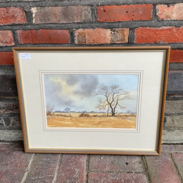 Watercolour painting of a peaceful farm landscape with fields.