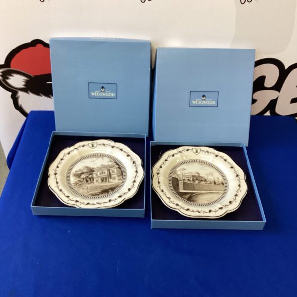 Two Wedgwood collectable plates with scenic transfer prints.