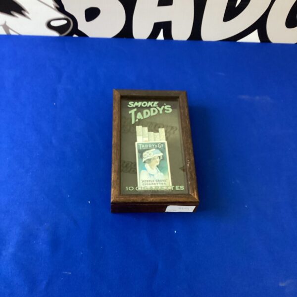 Vintage framed Taddys cigarette box, colourful advertising ephemera.