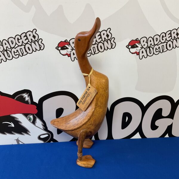 Rosemary the wooden duck, a collectible folk art figurine.