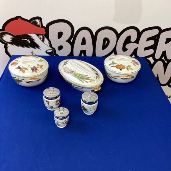 Vintage Royal Worcester vegetable bowls with floral design.