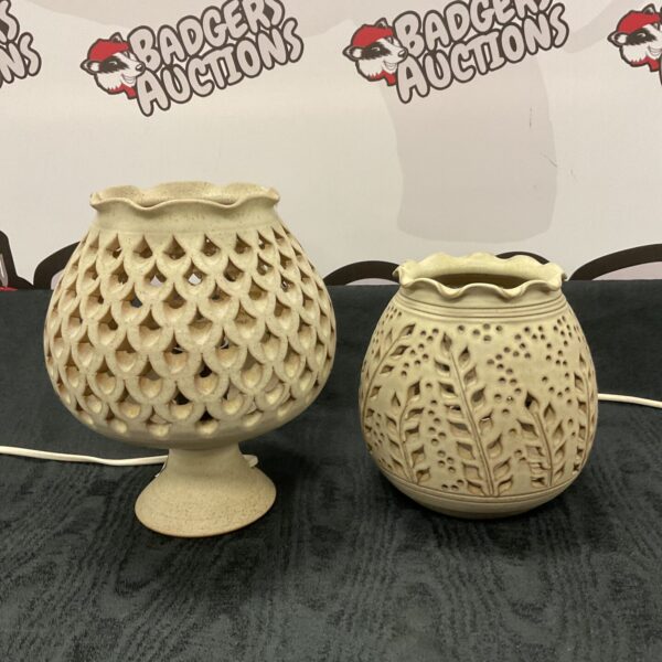 Pair of vintage studio pottery table lamps with intricate design.