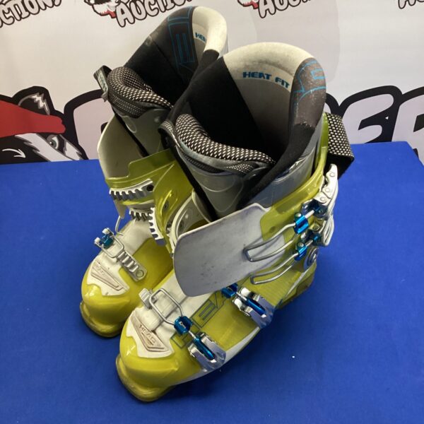 Side view of a pair of Head ski boots, winter sports equipment.