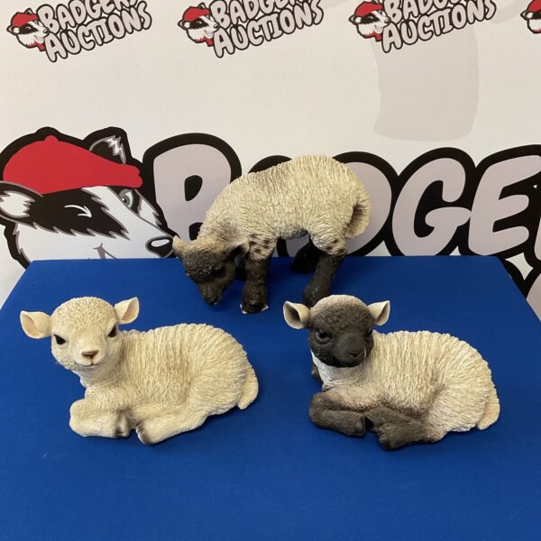 Set of three colourful arts lamb ornaments for home decor.
