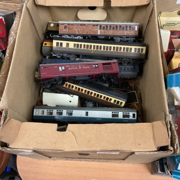 Vintage train carriages in a box, collectible model railway.