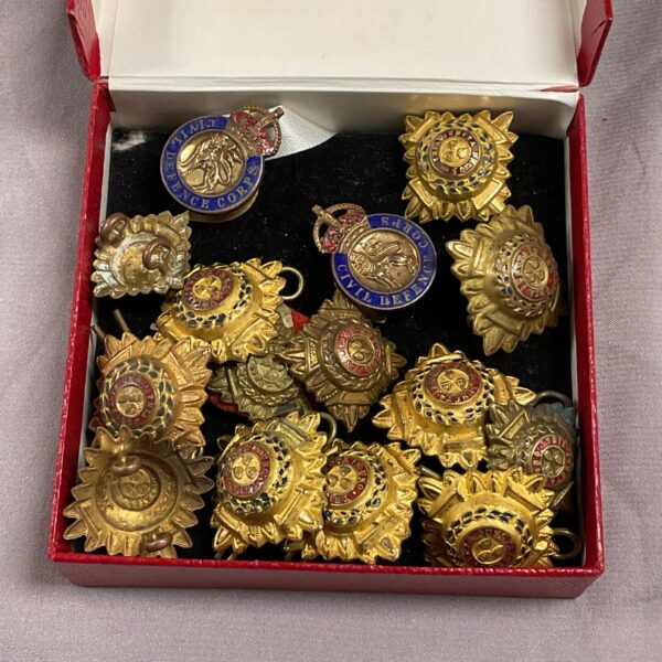 Vintage British Army rank pips and Civil Defence badges collection.