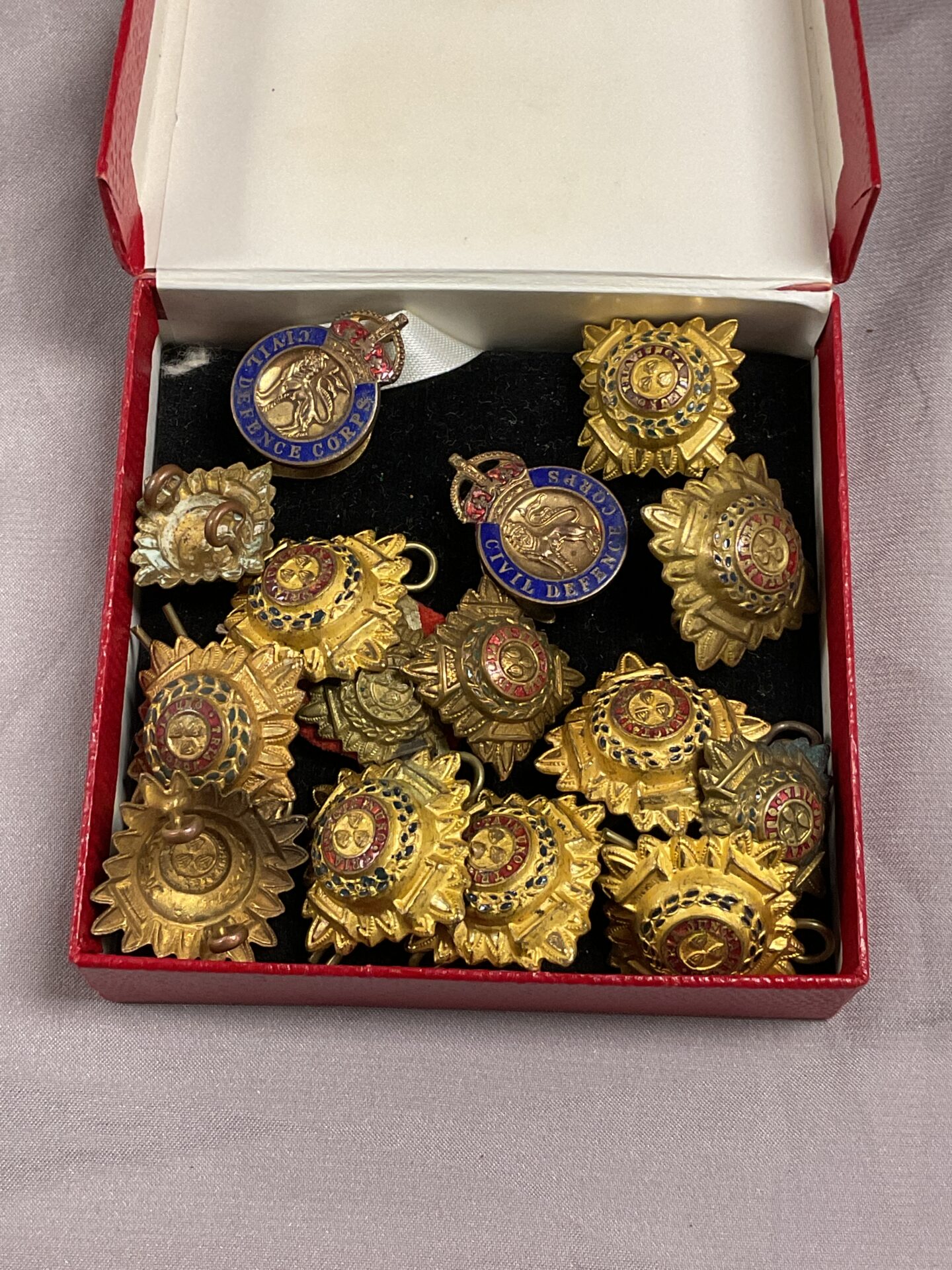 803 quantity of British army rank pips and two civil defence badges