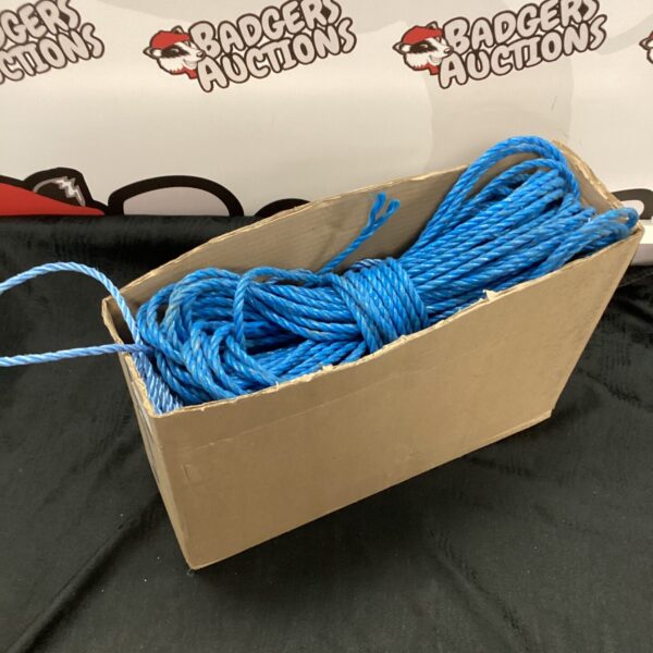 Blue braided rope bundle, coiled and ready for use.