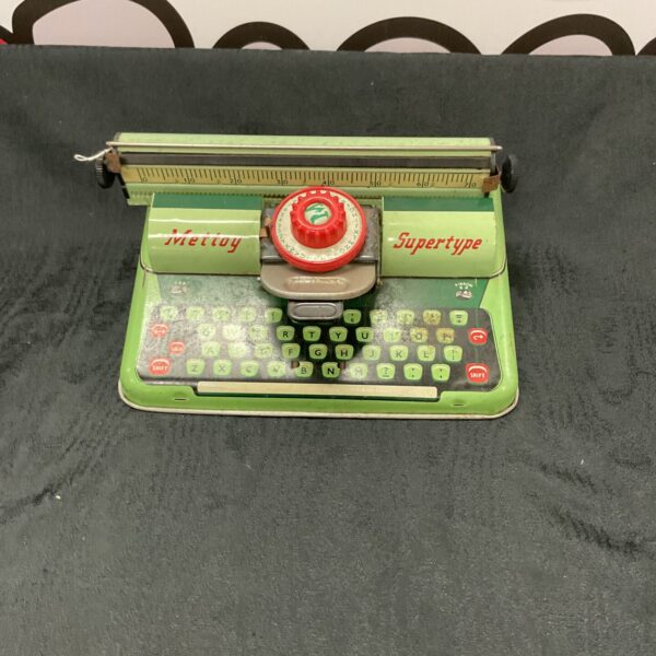 Vintage Mettoy Supertype typewriter, colourful tin toy, collectible.