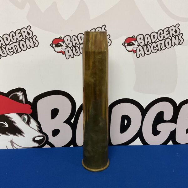 Vintage 1942 55mm shell casing, WWII military collectable.