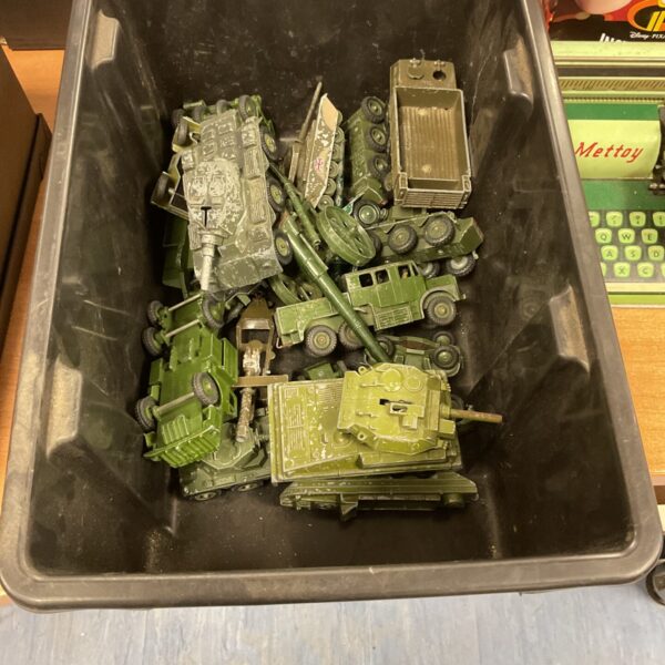 Vintage lot of military vehicles including Dinky and Corgi models.
