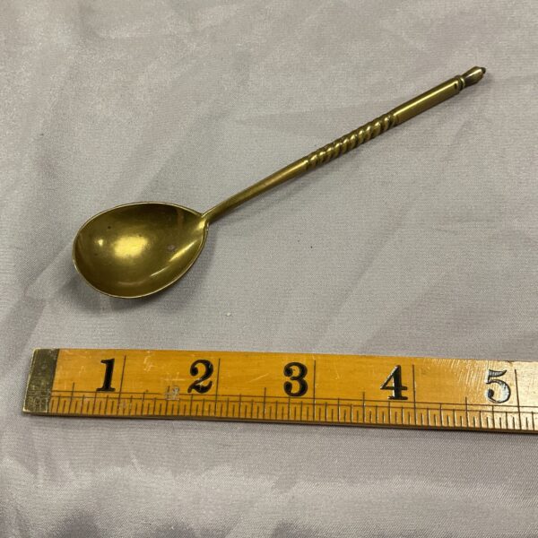 Antique Russian caviar spoon made of brass with twisted handle.
