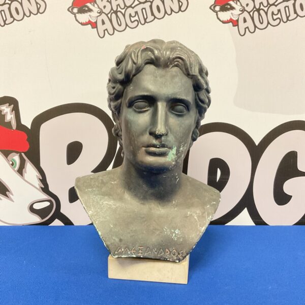 Antique terracotta bust of Dionysus, a Greek god sculpture.