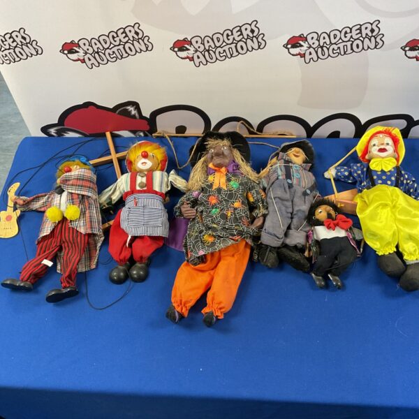 Vintage string puppet lot, collectible marionettes for display.
