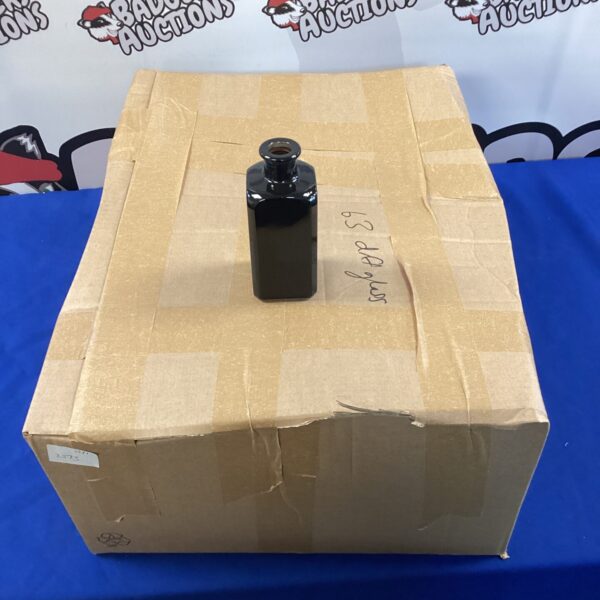 Lot of approximately 63 glass diffuser bottles for aromatherapy and essential oils.