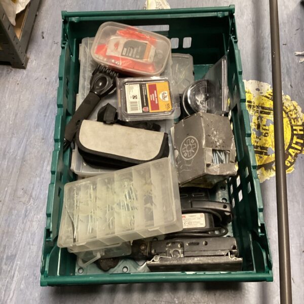 Tray of assorted tools and hardware including a Skill planer.