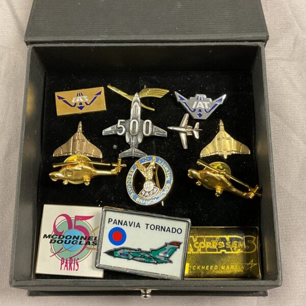 Collection of RAF aviation pin badges for collectors.