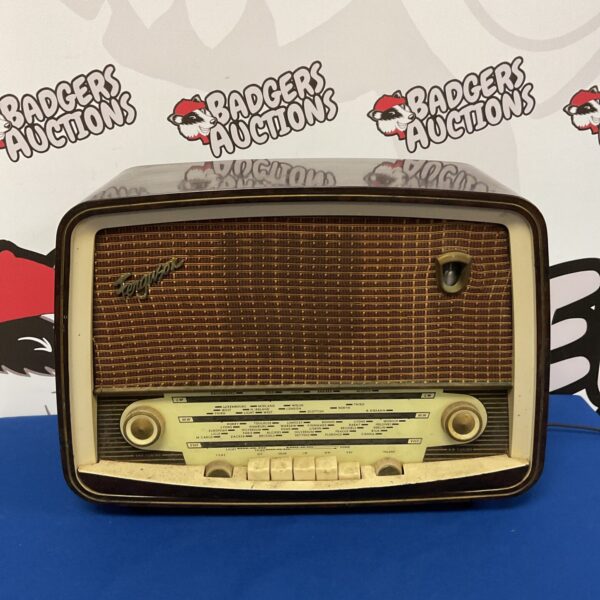 Vintage Fergusson valve radio with wooden cabinet and dial.