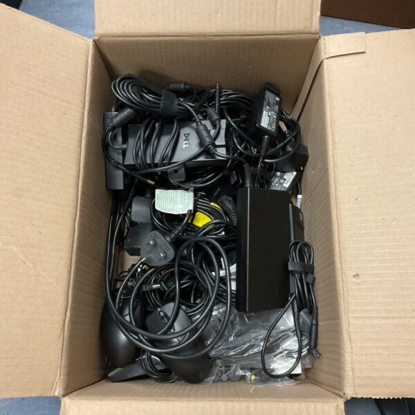 Collection of laptop power supplies including Dell and HP adapters.