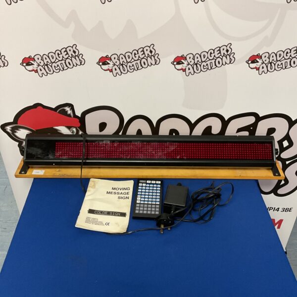 Red LED moving message sign with control panel.
