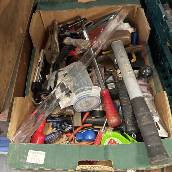 Assorted hand tools in a shed clearance lot for DIY projects.