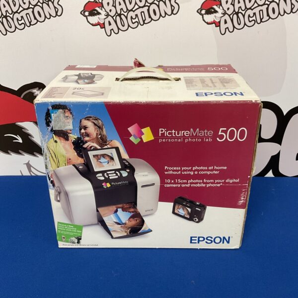 Epson PictureMate 500 printer with paper pack for home photo printing.