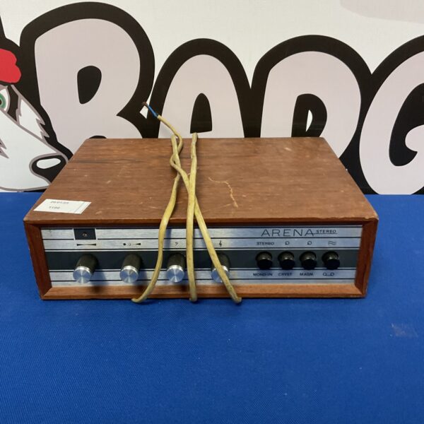 Front view of vintage Arena stereo amplifier with wooden cabinet.