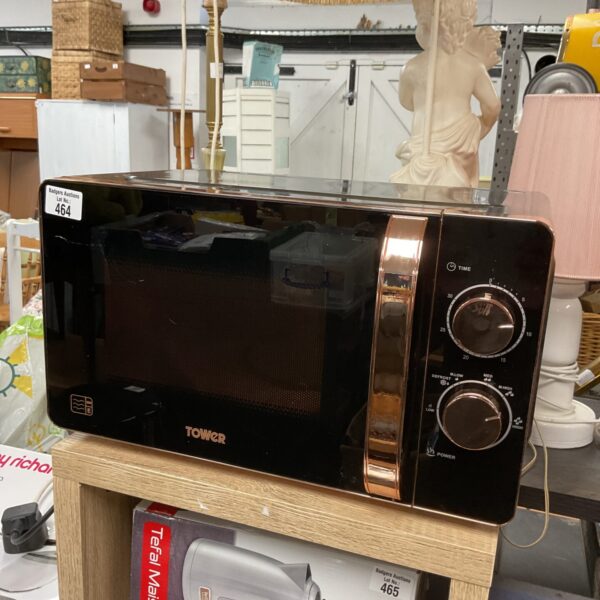Cream retro Tower microwave for kitchen use.