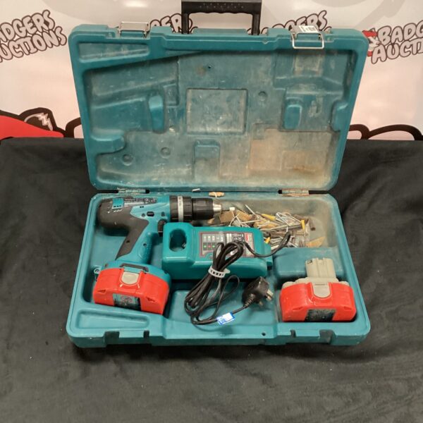 Vintage Makita 8391 cordless drill in its original case.