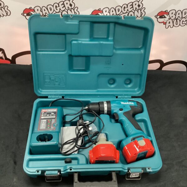 Vintage Makita 6010D battery screwdriver kit in original case.