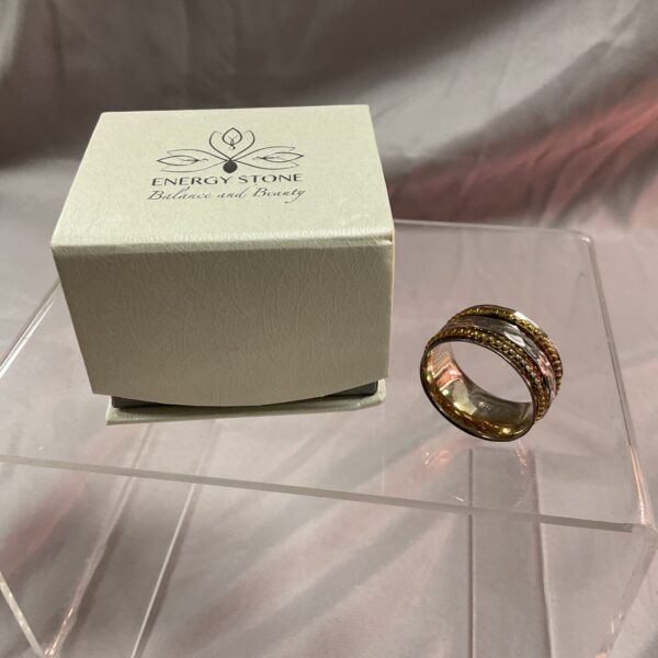 Silver spinner ring with three bands, size Y.
