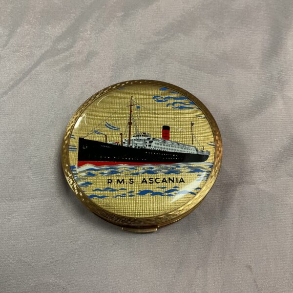 Vintage Stratton RMS Ascania powder compact with ship illustration.