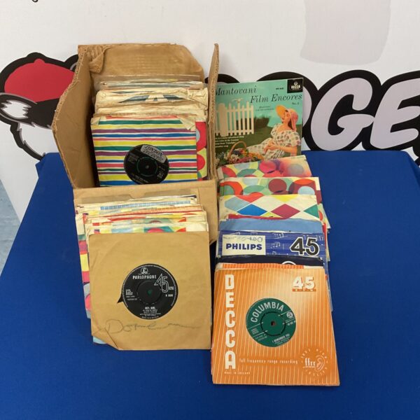Vintage 7 inch vinyl records lot for collectors and music fans.