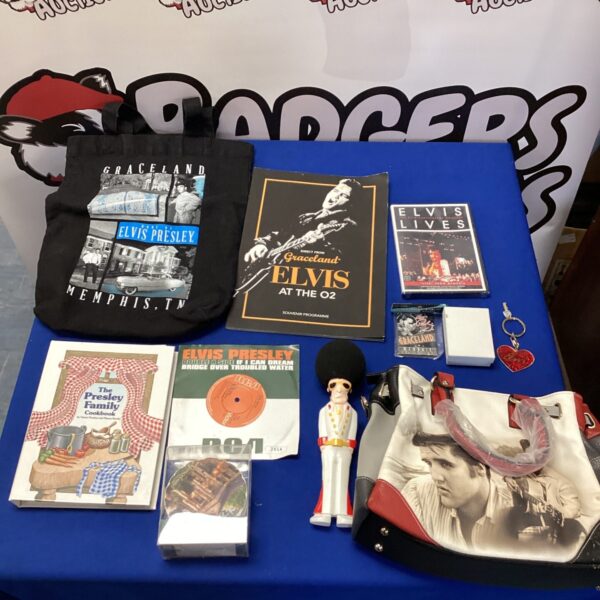Elvis Presley memorabilia lot including Graceland programme and handbag.