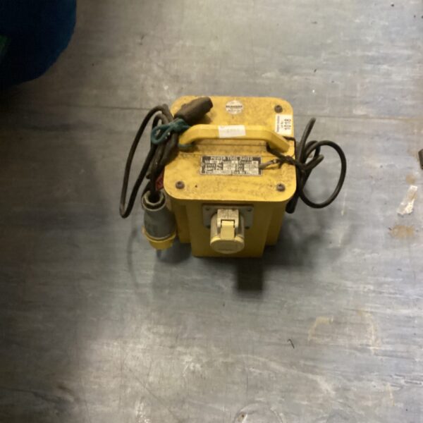 Vintage 110v transformer with wired connection and outlet.