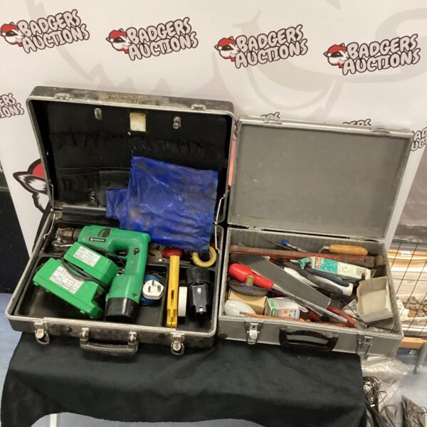 Hitachi drill set in a carrying case, showing various tools.