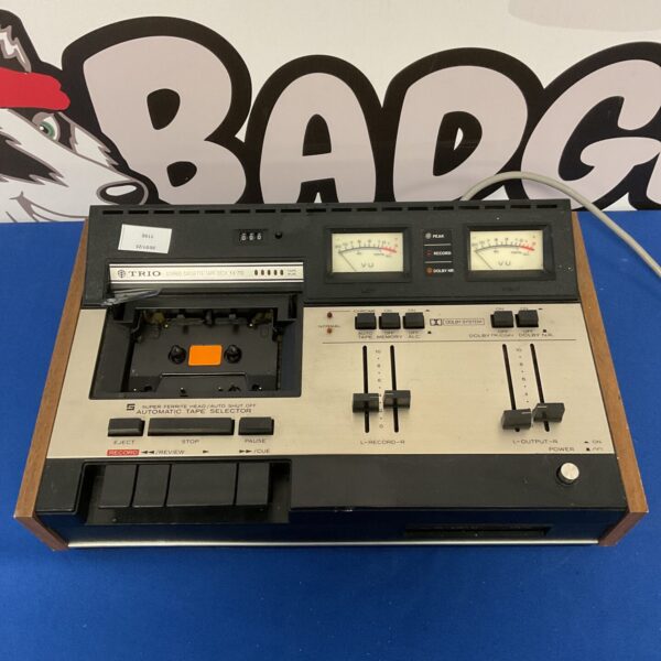 Vintage Trio kx-710 stereo cassette deck with level meters.
