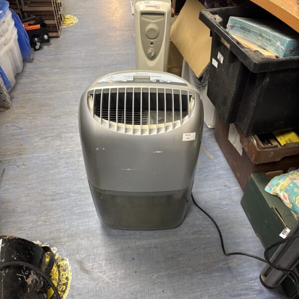 White Homebase portable dehumidifier for moisture removal.