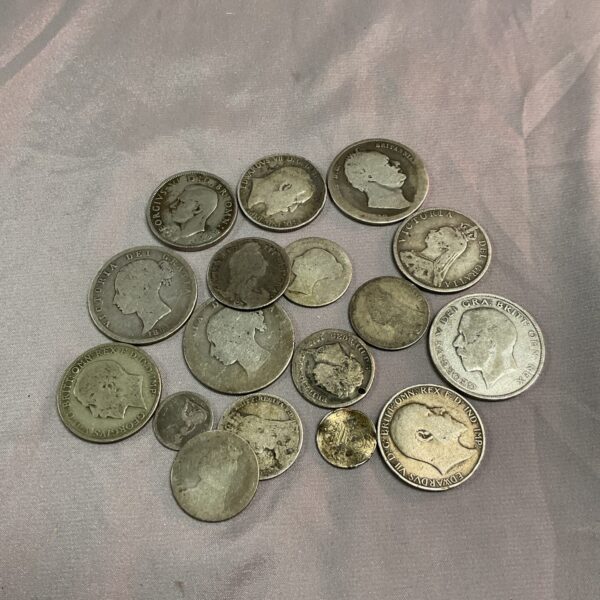 Lot of British silver scrap coins for collectors or bullion.