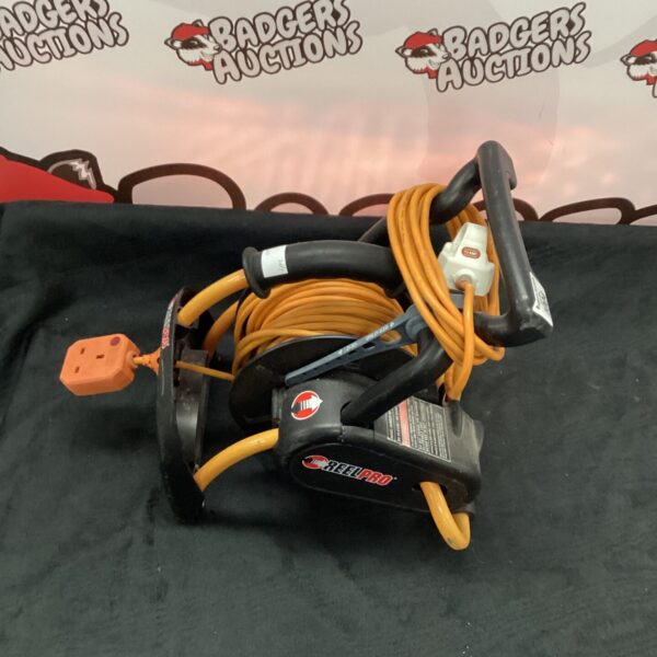 Yellow Reelpro extension reel with cable wound around it.