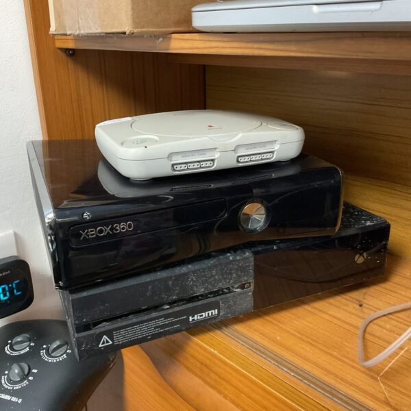 Xbox 360 console lot with Xbox One and PlayStation Slim.